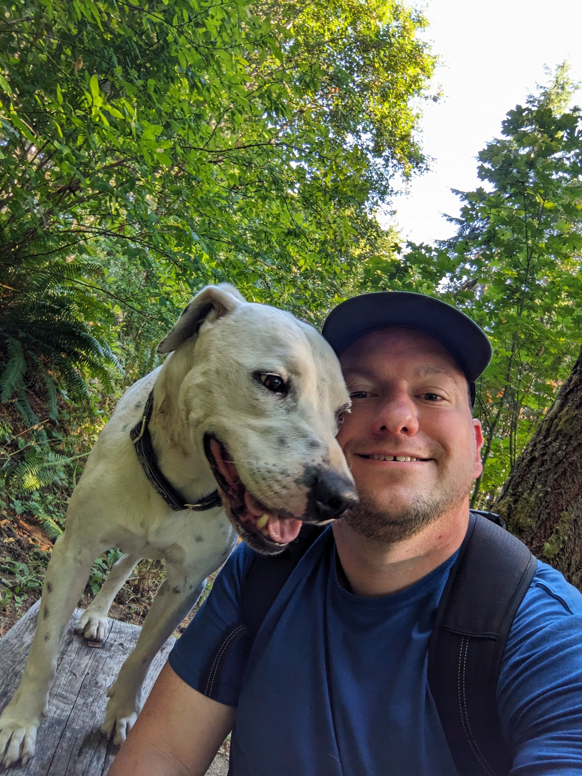 Steve with his dog on a forest trail in Hillsboro, OR