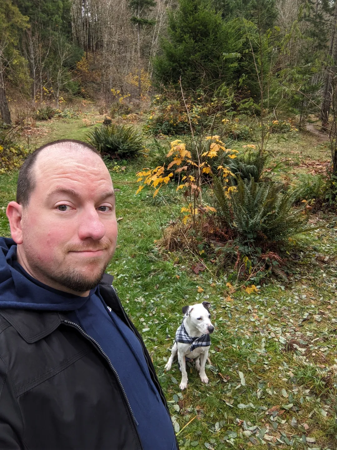 Steve with his dog in the yard